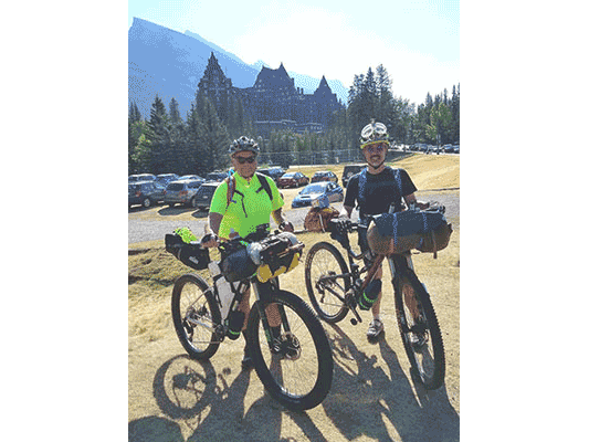 Larry and Roy on bicycles